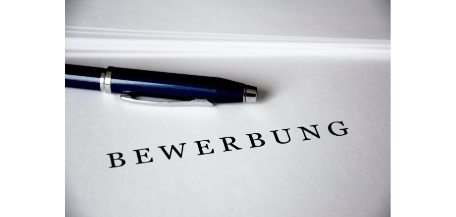 Stift auf Bewerbungsmappe 